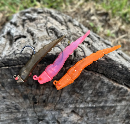 Saltwater shrimp jigheads and tails, tough durable plastic. Great for snook, tarpon, redfish, trout, brack drum and many more species. 